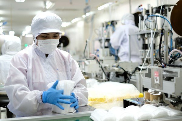 Image Caption: Yokoisada mask manufacturing plant